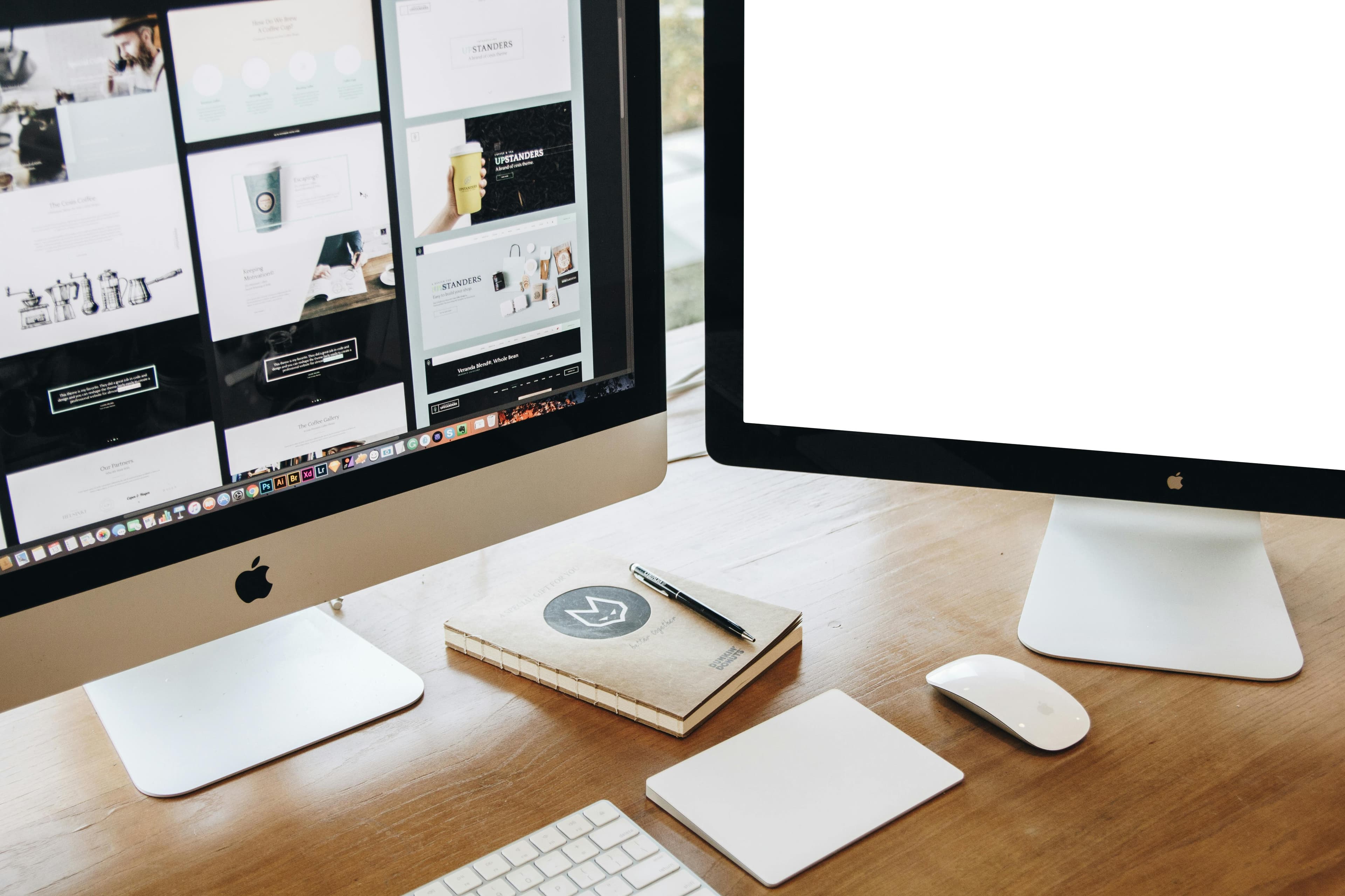 Computer with a notepad, keyboard, mouse and a digital device to draw designs.