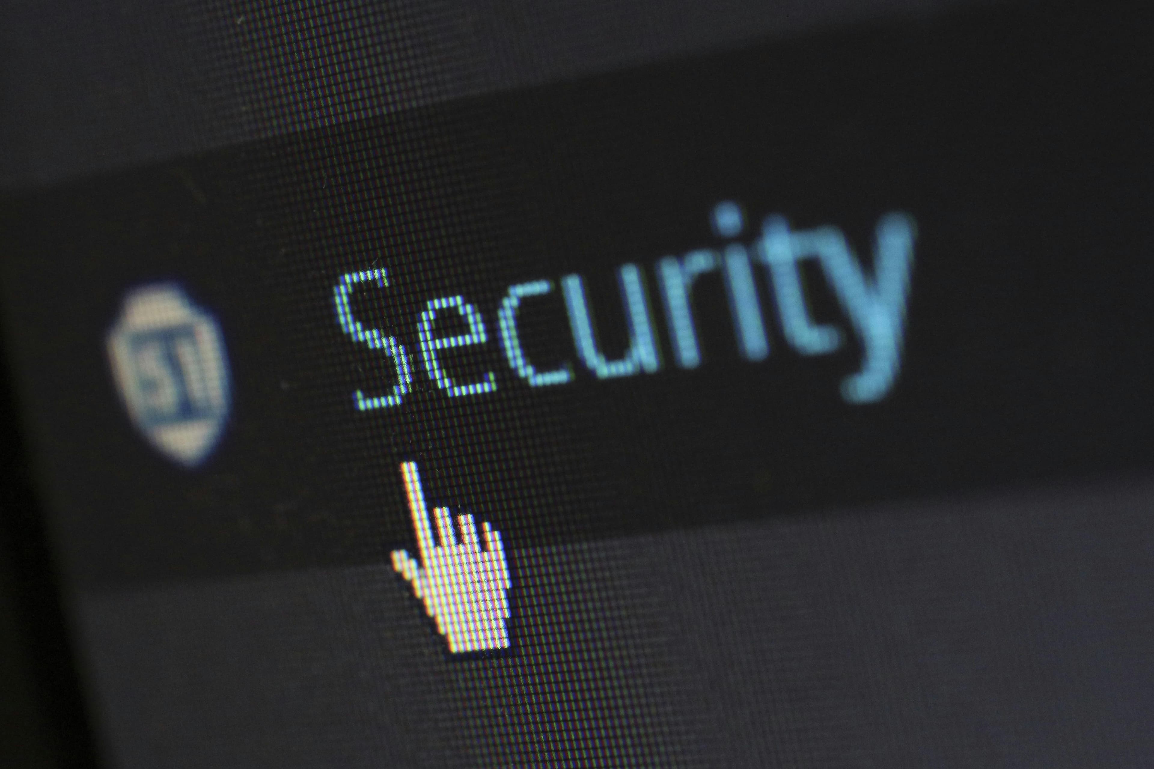 Website with the word security with a hand shaped cursor over it